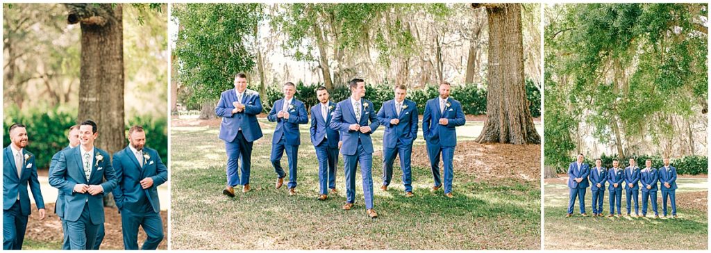 Groom with groomsmen all wearing blue suits