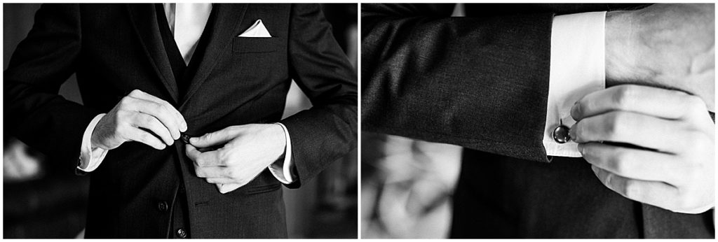 Black and white portrait of groom getting ready