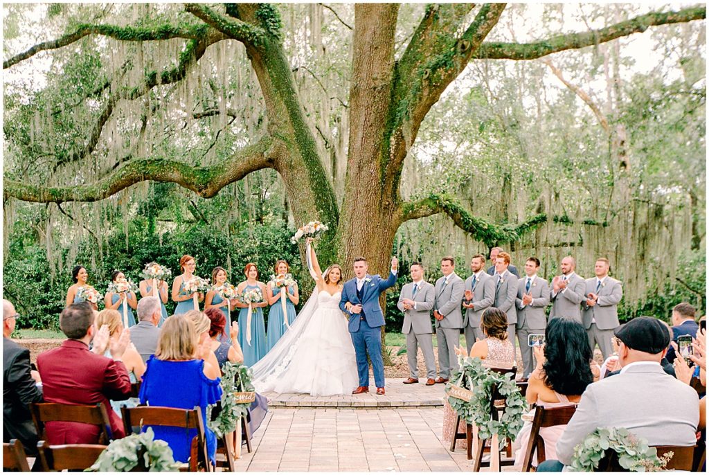 Bride and groom at wedding ceremony at Bowing Oaks | By Nikki Golden, Jacksonville Wedding Photographer