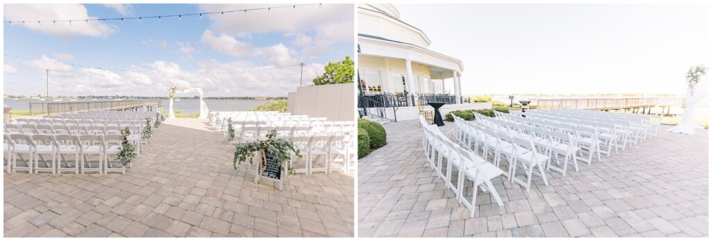 waterfront wedding ceremony set up with white chairs on a stone patio