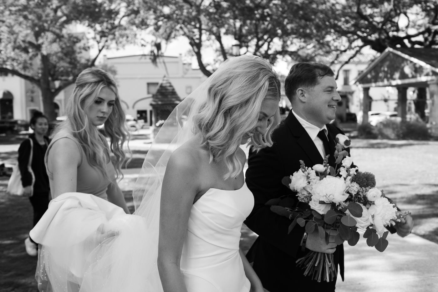 Bride and groom walking around downtown St Augustine after their wedding ceremony