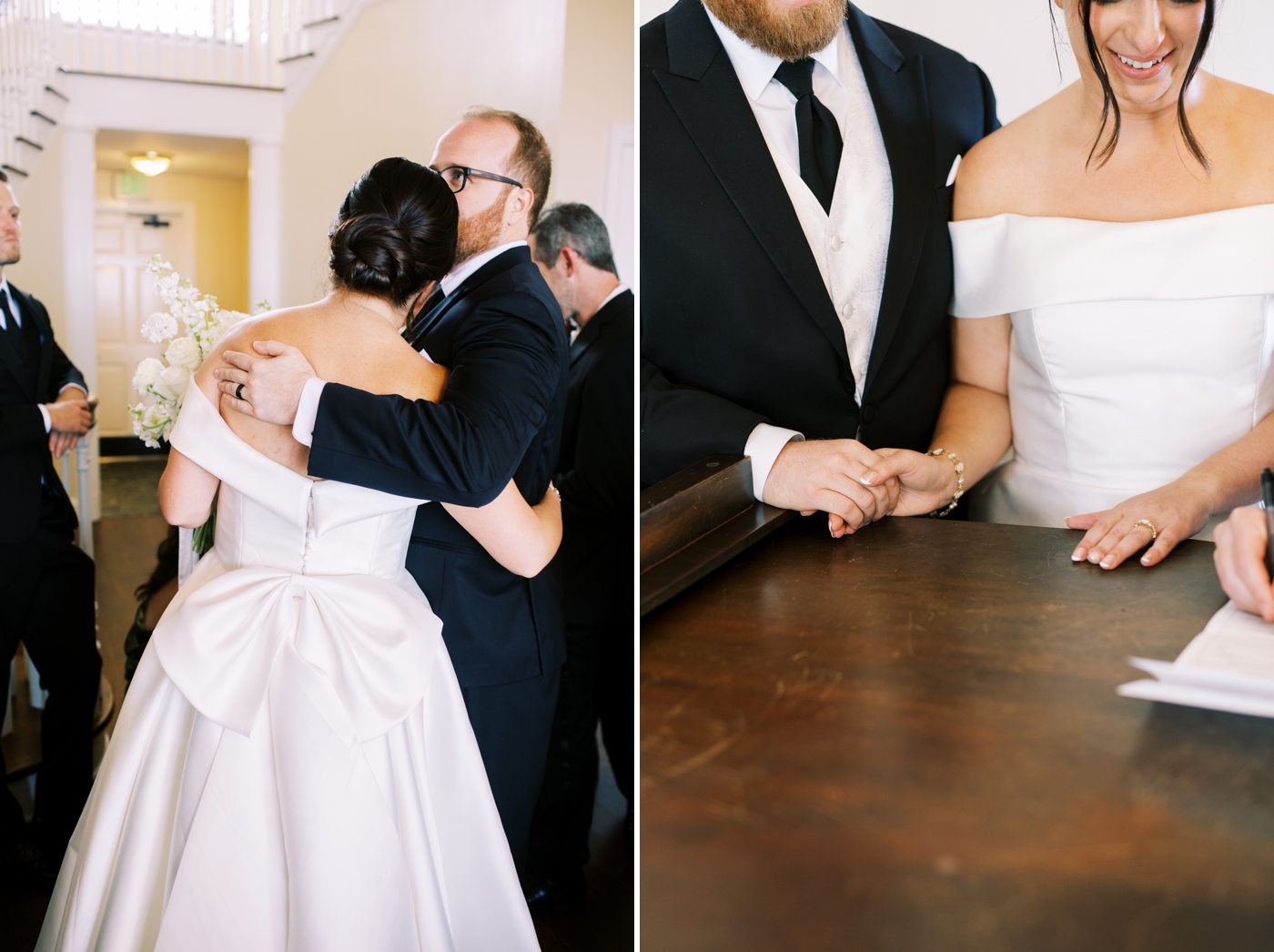 Bride and groom holding hands while watching officiant signing their wedding license 