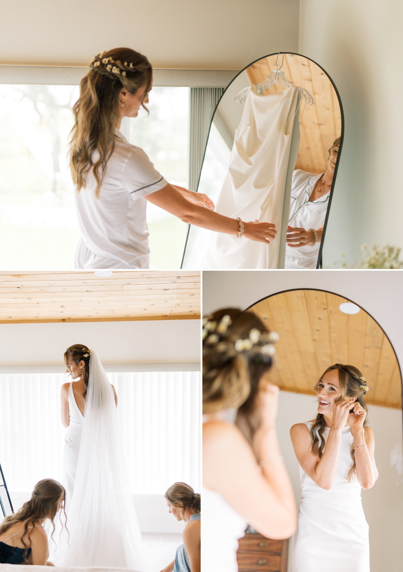 Bride smiling and putting on earrings in a mirror 