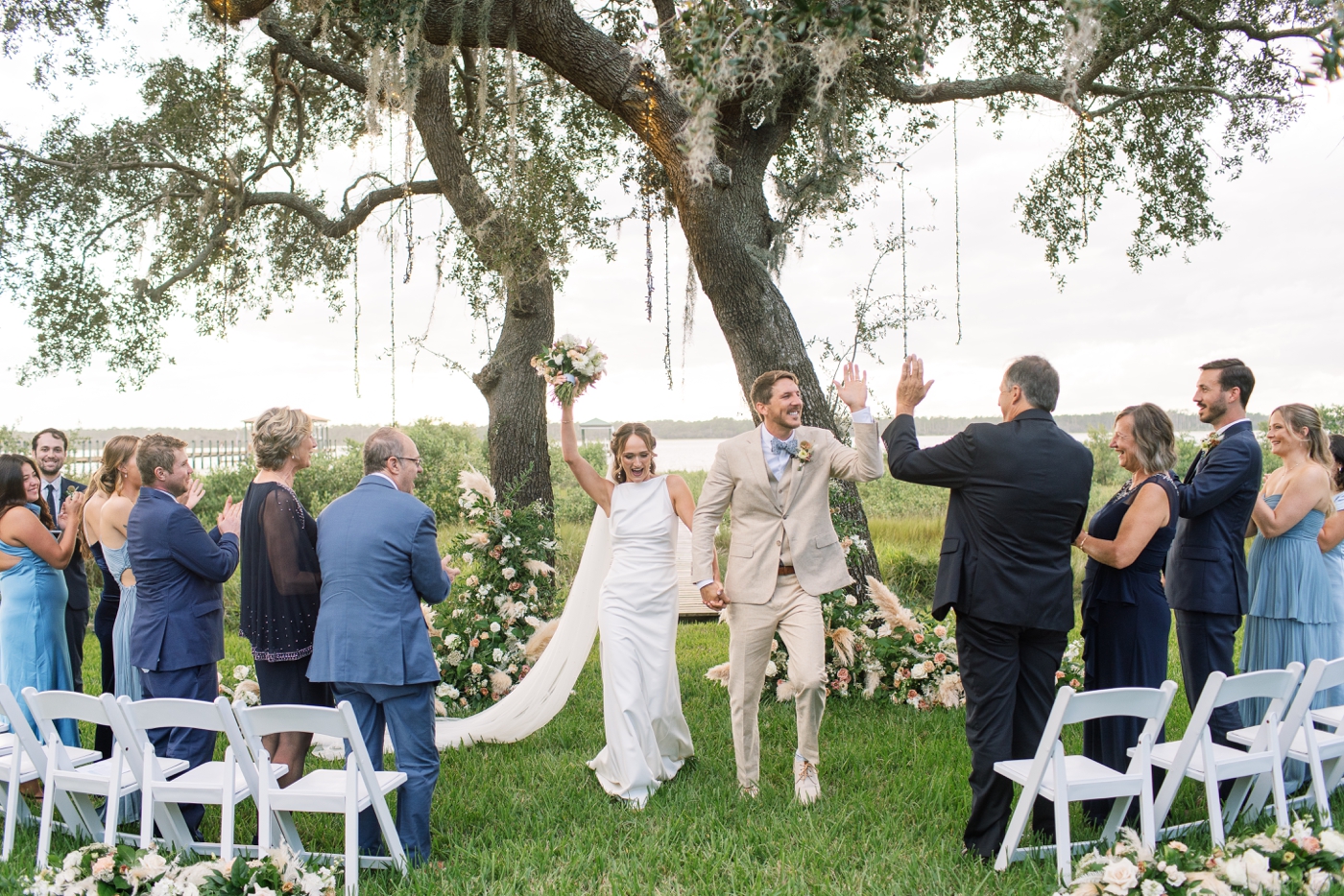 Bride and groom backyard wedding ceremony recessional